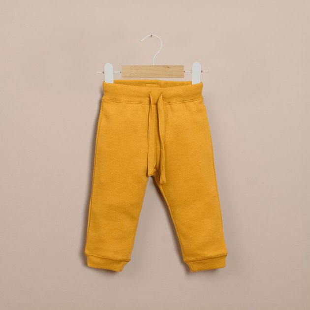 Pantalón de buzo amarillo de  niño