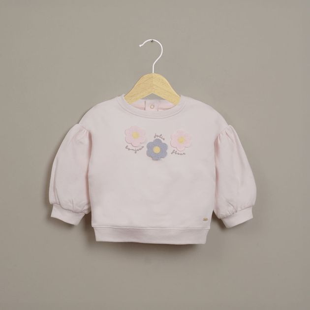 Polerón rosado con bordado de niña
