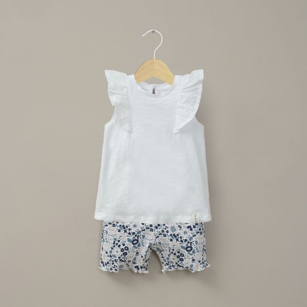 Conjunto calza y polera blanca de niña